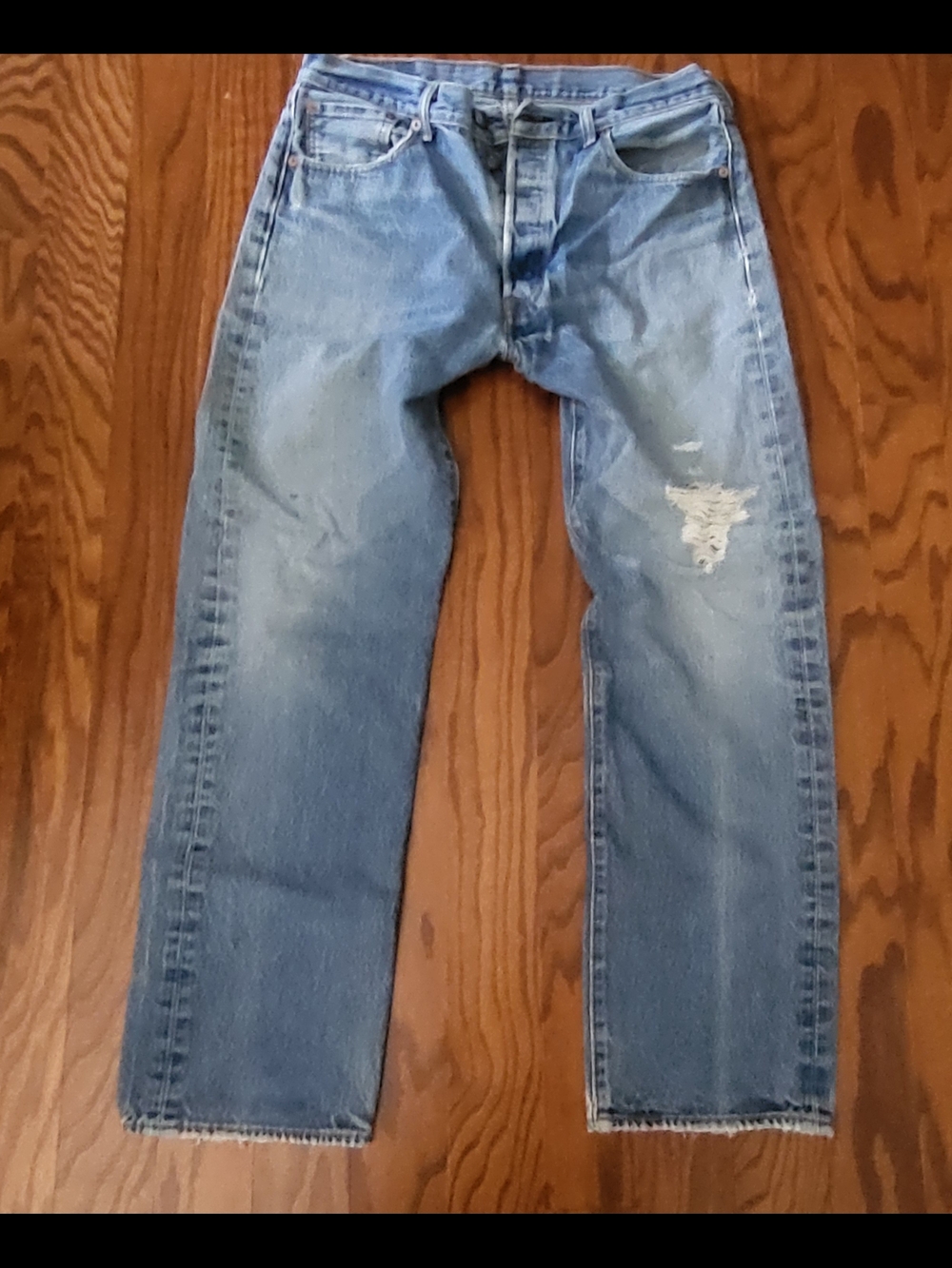 Levi's Men's 501 Buttonfly Light Blue Straight-Leg Jeans with Distressed Detail - Picture 1 of 3